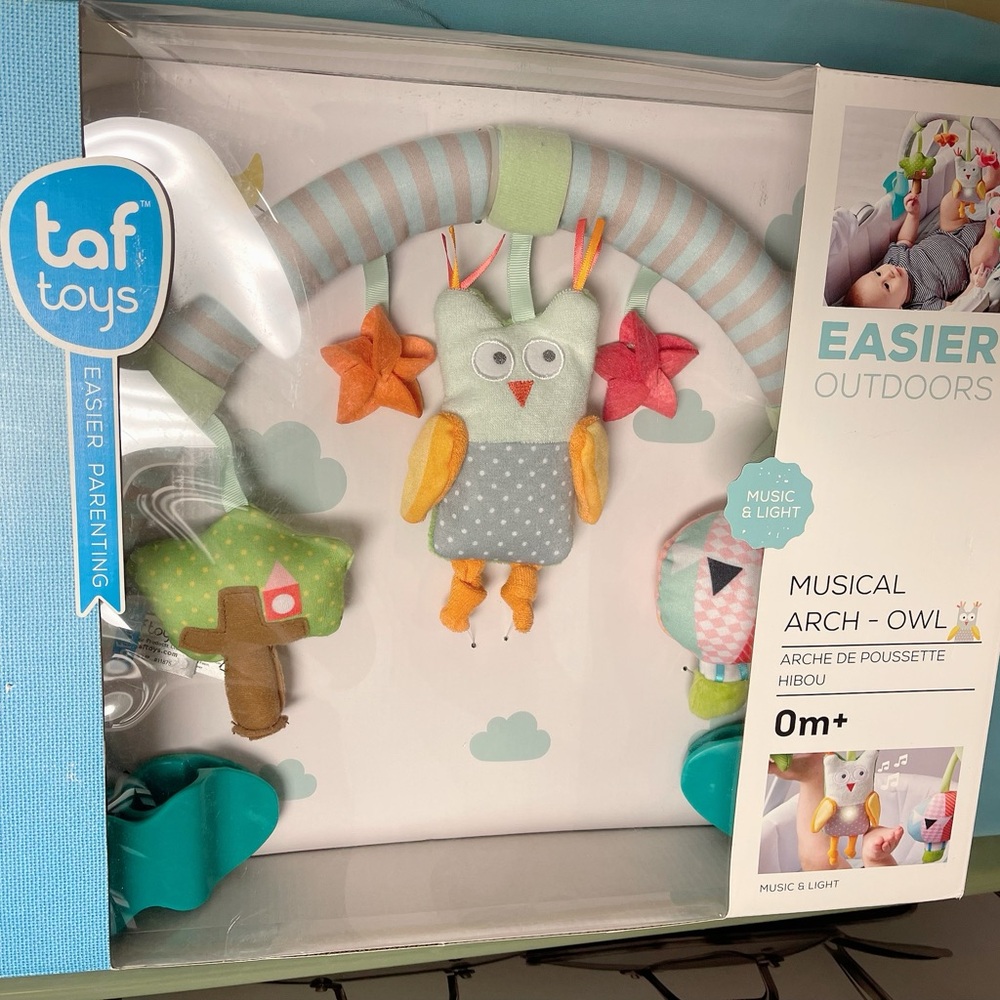 Musical Arch featuring a charming owl. toy stimulates your baby's senses music.
